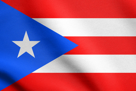 Puerto Rican national official flag. Patriotic symbol, banner, element, background. Flag of Puerto Rico waving in the wind with detailed fabric textureの写真素材