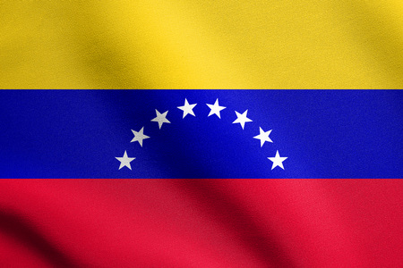 Venezuelan national official flag. Bolivarian Republic of Venezuela patriotic symbol, banner, element, background. Flag of Venezuela waving in the wind with detailed fabric textureの写真素材