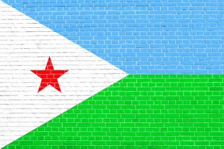Djiboutian national official flag. Patriotic symbol, banner, element, background. Accurate dimensions. Correct size, colors. Flag of Djibouti on brick wall texture backgroundの写真素材