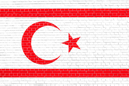 Northern Cyprus national official flag. TRNC patriotic symbol, banner, element, background. Correct size, colors. Flag of Turkish Republic of Northern Cyprus on brick wall texture backgroundの写真素材