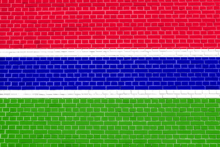 Gambian national official flag. African patriotic symbol, banner, element, background. Flag of the Gambia on brick wall texture backgroundの写真素材