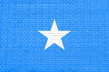 Somali national official flag. African patriotic symbol, banner, element, background. Flag of Somalia on brick wall texture backgroundの写真素材