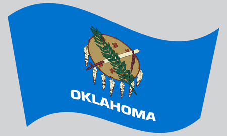 Oklahoman official flag, symbol. American patriotic element. USA banner. United States of America background. Flag of the US state of Oklahoma waving on gray background, vectorのイラスト素材