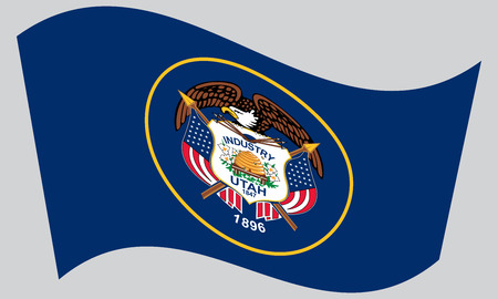 Utahn official flag, symbol. American patriotic element. USA banner. United States of America background. Flag of the US state of Utah waving on gray background, vectorのイラスト素材