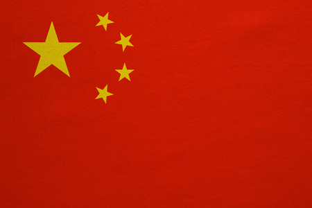 Chinese national flag. Symbol of the People's Republic of China. Patriotic PRC background design. Correct colors. Flag of China with real detailed fabric texture, accurate size, illustrationの写真素材