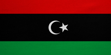 Libyan national official flag. African patriotic symbol, banner, element, background. Correct colors. Flag of Libya with real detailed fabric texture, accurate size, illustrationの写真素材