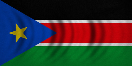 South Sudanese national official flag. African patriotic symbol, banner, element, background. Correct colors. Flag of South Sudan wavy with real detailed fabric texture, accurate size, illustrationの写真素材