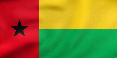 Bissau-Guinean national official flag. Patriotic symbol, banner, element, background. Correct colors. Flag of Guinea-Bissau waving in the wind, real detailed fabric texture. 3D illustrationの写真素材