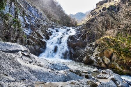 Fast mountain stream in a canyonの写真素材