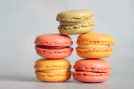 Colorful macaroons on a white background, close up.の写真素材
