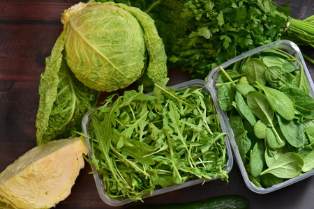 Fresh green vegetables on a wooden table. Selective focus. Food backgroundの写真素材