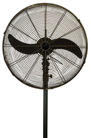Old electric fan is rusty and dirty on white の写真素材