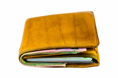 Brown old leather wallet isolated on white background