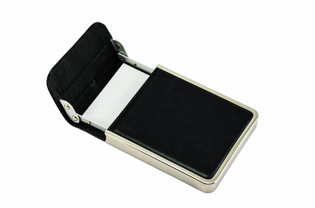 Business card in a leather box isolated on white backgroundの写真素材