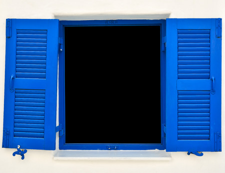 open old blue window on the white wall for backgroundの写真素材
