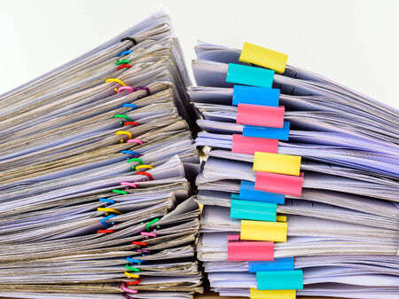 Close up stack document of account include sales waiting to be managed on wood table