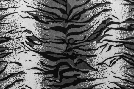 texture of print fabric striped tiger leather for backgroundの写真素材
