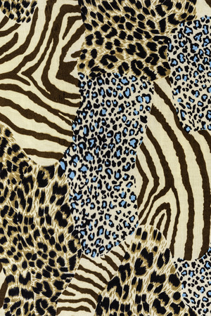 texture of print fabric striped leopard and zebra for backgroundの写真素材