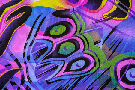 texture of print fabric striped peacock feathers for background