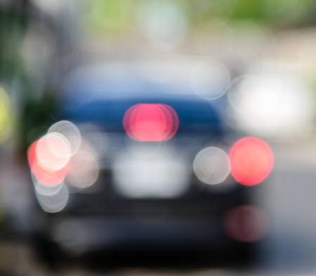 blurred bokeh from car light in daytime for backgroundの写真素材