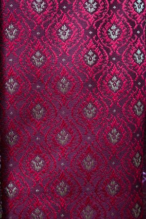 Thai red Sarong Silk  fabricの写真素材