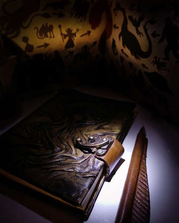 leather notebook on the mystic backgroundの写真素材