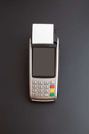 pos machine on black backgroundの写真素材