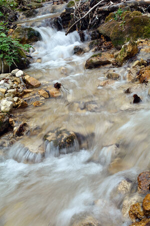 Rocky mountain stream it is blurred.の写真素材