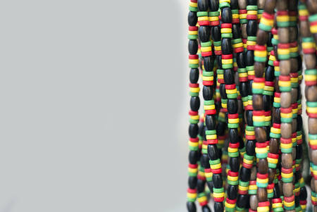 Colorful bracelets and necklaces with beads, rasta theme.の写真素材