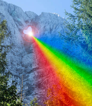heart shape in rock's with rainbow goin out.の写真素材