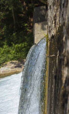 Clean water stream, photographed with long exposure time.の写真素材