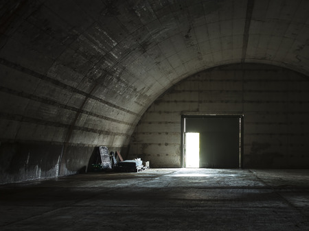 Old military hangar used to storage stuff.の写真素材