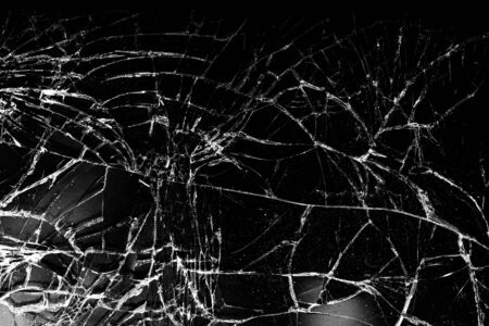 Shattered glass with a lot of cracks, texture.