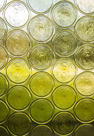 Glass circle texture, with blured background.の写真素材