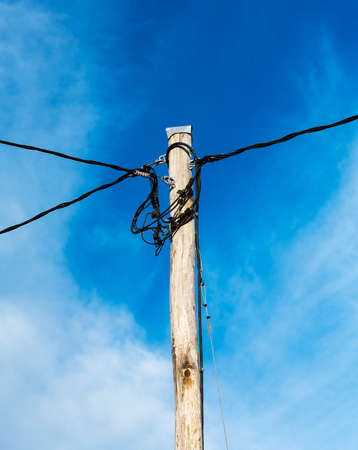 Eooden electric pole with cable lines.の写真素材