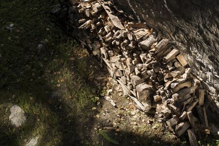 Small stack of wood for fire place in winter.の写真素材