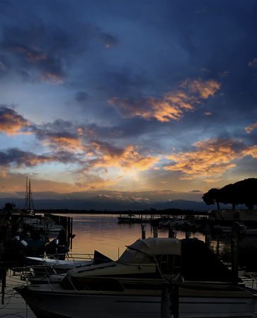 Small fishing boats floating on water.の写真素材