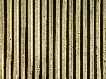 Wall close up with some shadows and lines.の写真素材