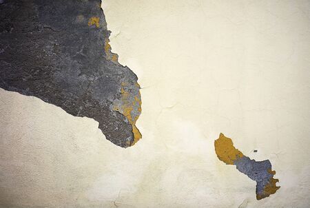 Wall paint layer is peeling off the wall.の写真素材