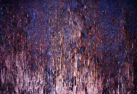 Damaged wood plank close up texture with purple and pink tones.