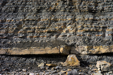 Formation of a stacked layers of rock over million of yearsの写真素材