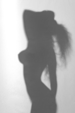 Sexy perfect nude woman silhouette - full naked bodyの写真素材