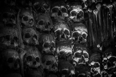 A Creepy Wall of Human Skulls in Portugals Chapel of Bones in Evoraの写真素材