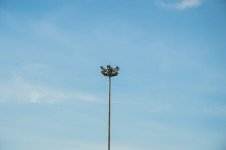street spotlight tower in the middle of blue skyの写真素材