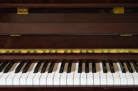 Wooden vintage piano closeupの写真素材