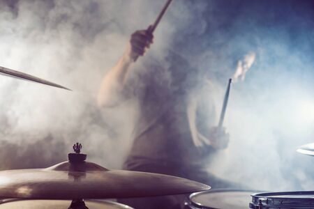 Drummer surrounded by fogの写真素材