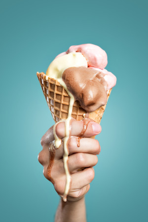 Melting ice cream coneの写真素材