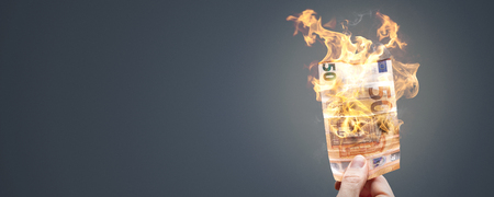 50 euros bill burning with a bright flameの写真素材