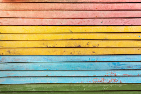 Old colorful wall made of wooden boardsの写真素材
