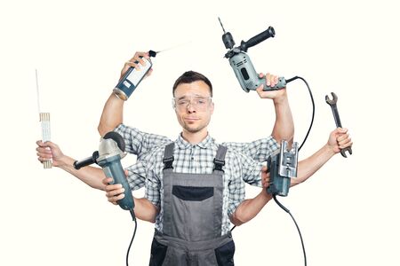 Funny portrait of a craftsman with 6 arms and toolsの写真素材